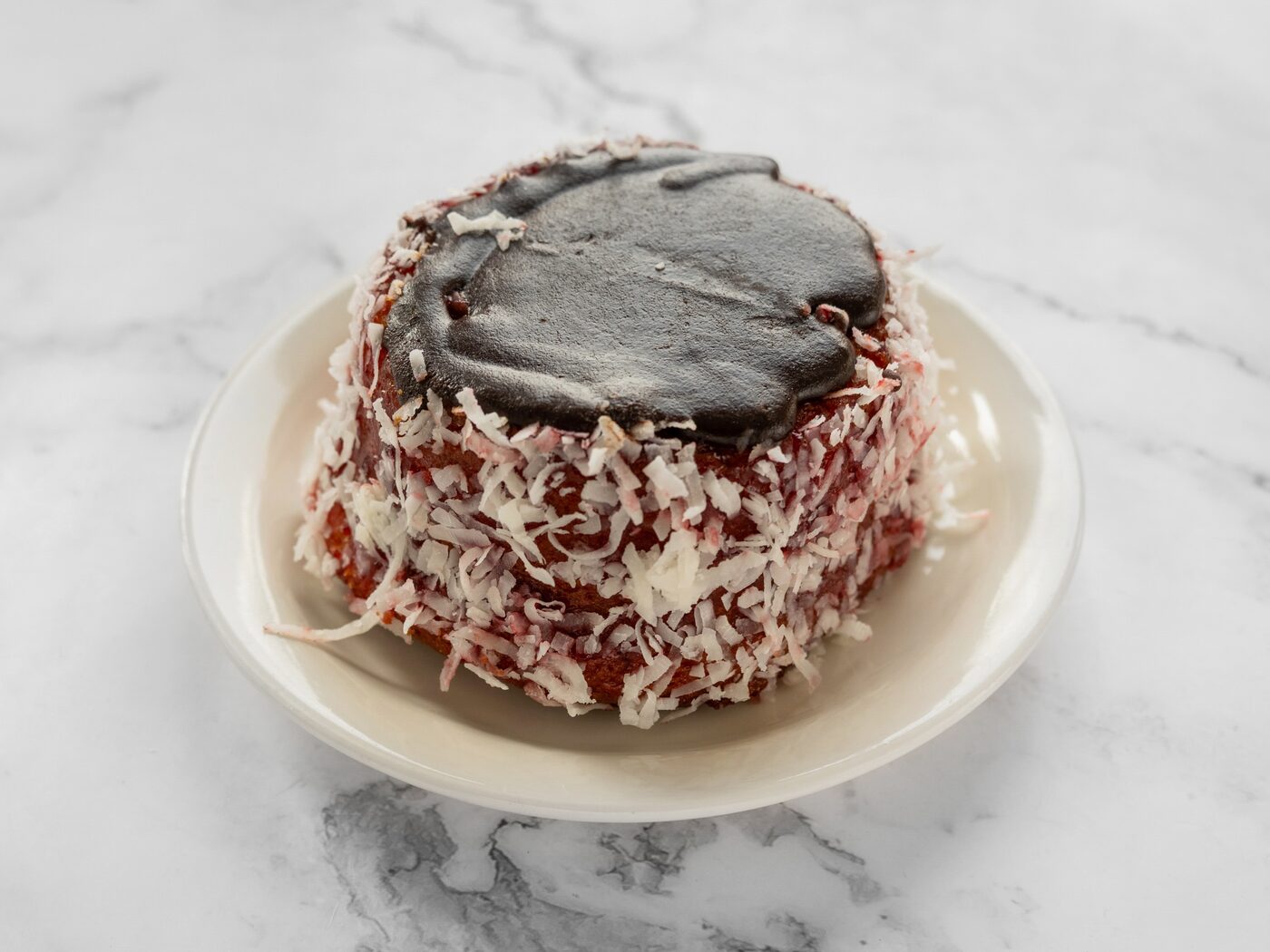 Wine cake with powdered sugar and jelly filling